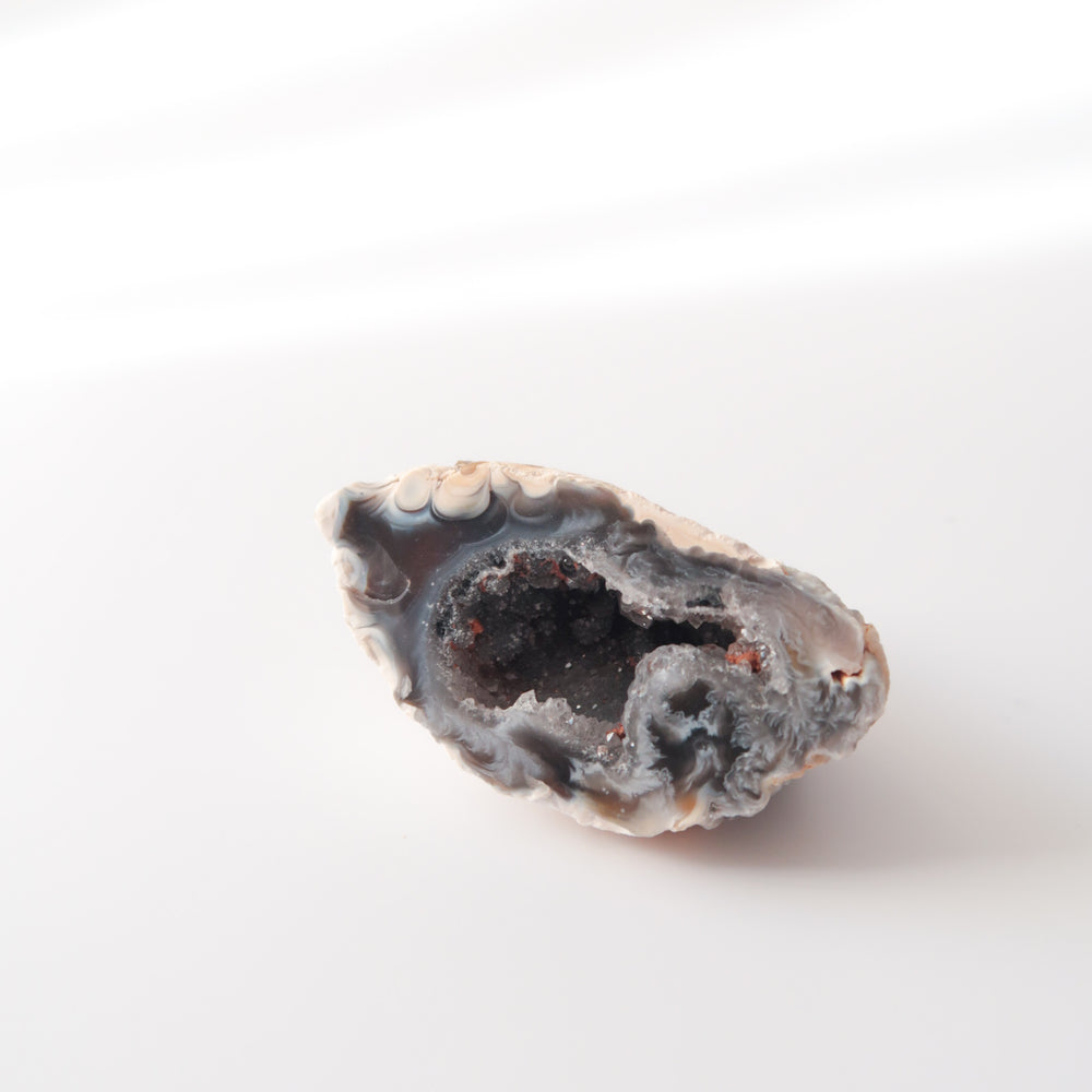 
                  
                    Natural Mini Dark Blue and Brown Druzy Agate Geode Half
                  
                