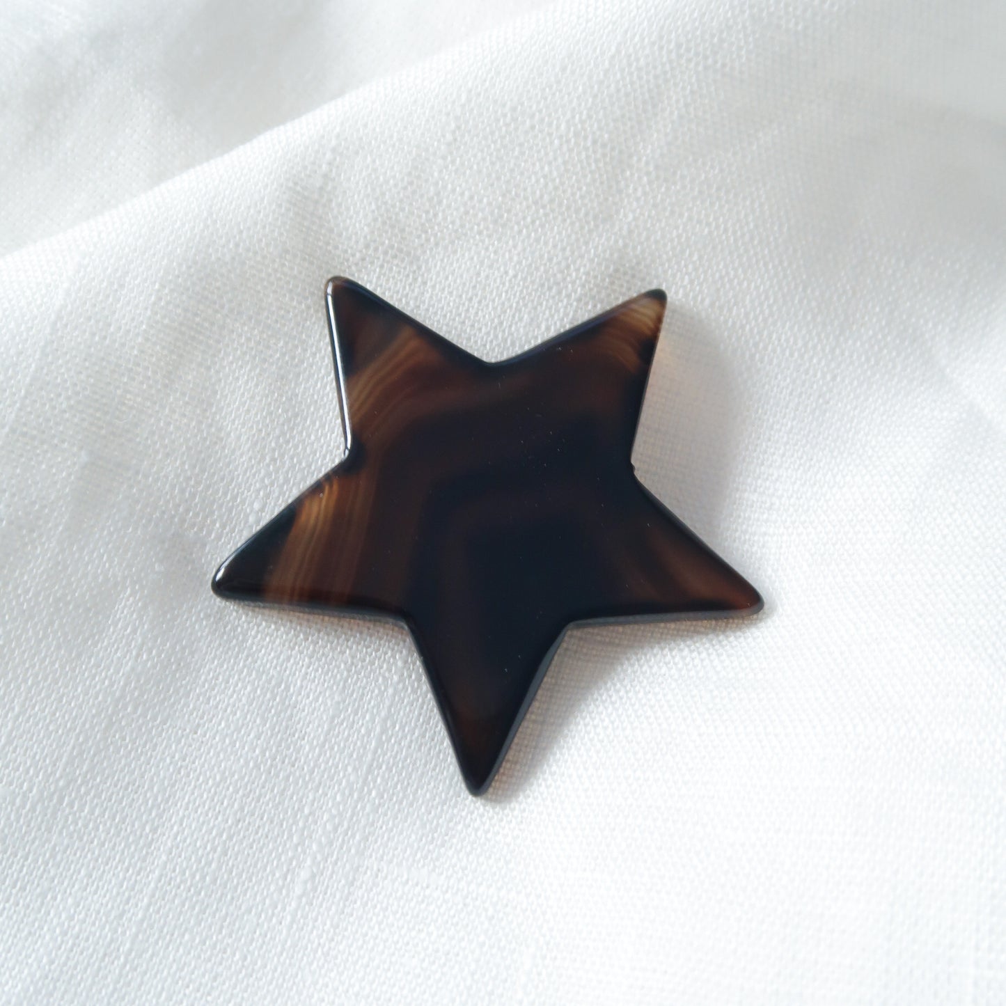 
                  
                    Natural Black/Brown Polished Agate Star Shape
                  
                